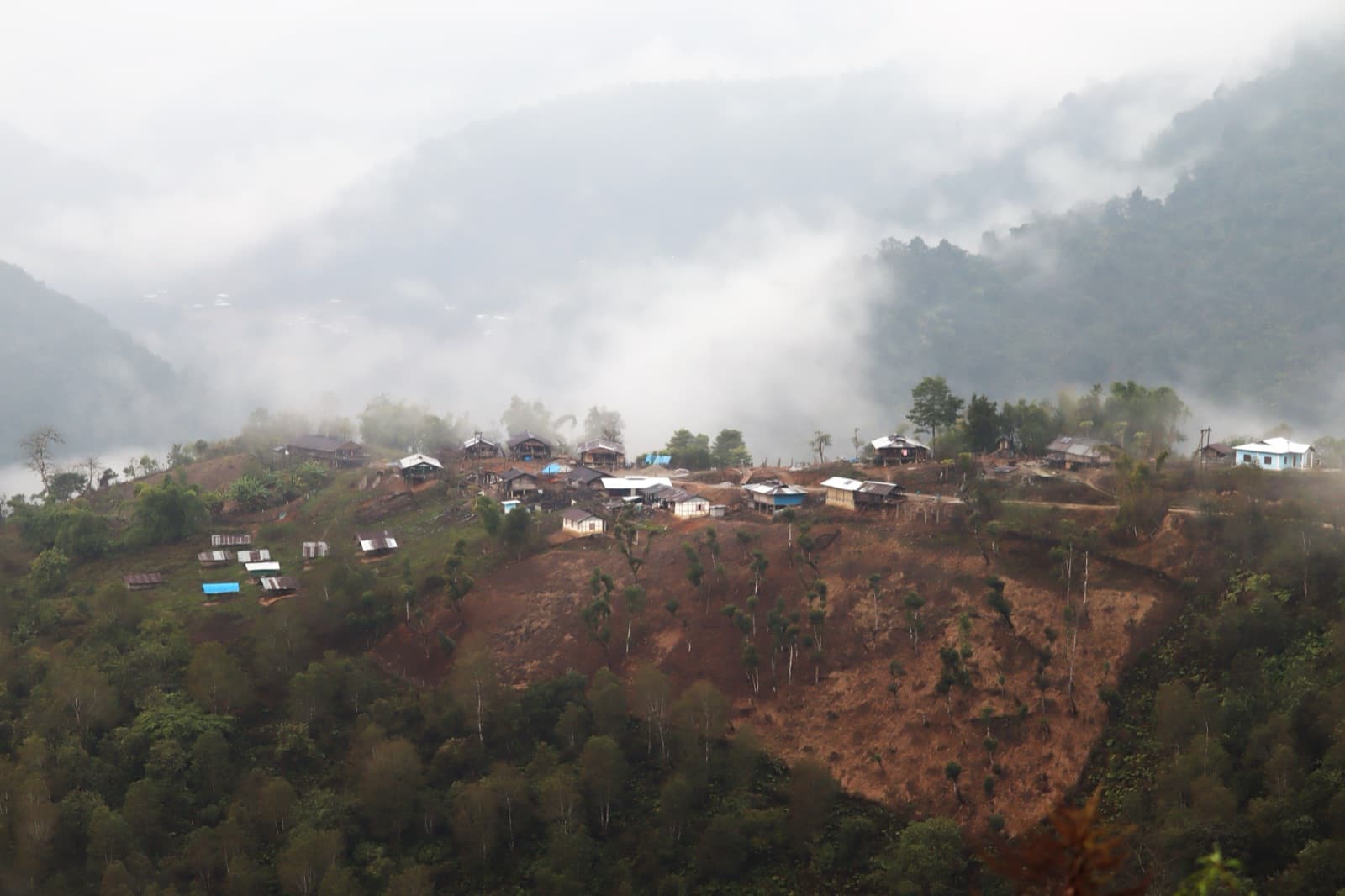 Misty mountains over a Puroik village in Arunachal Pradesh