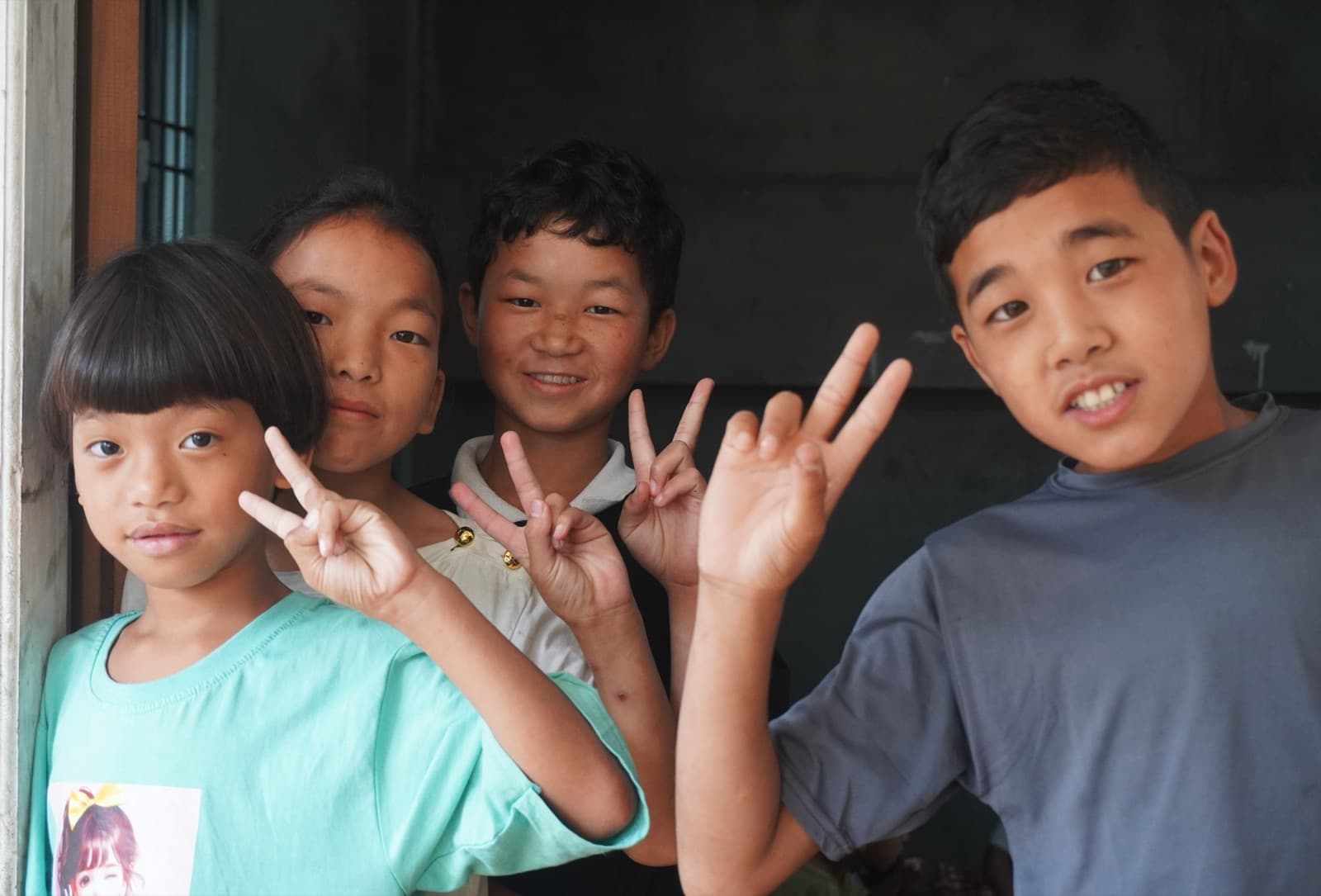 Four Puroik children at the Bichom campus