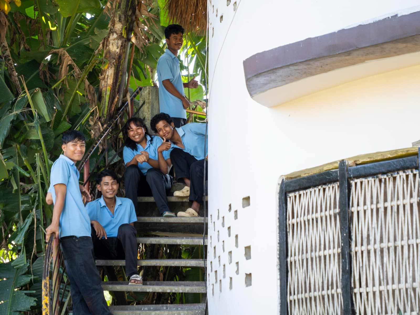 Hummingbird students on the stairs of one of the school's circular classrooms